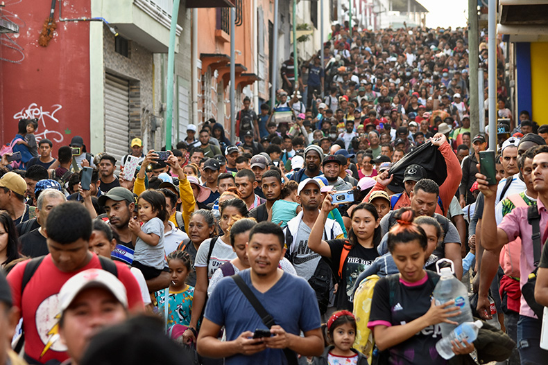 Migrants start walking north on their way to Mexico City from Tapachula, Chiapas state, Mexico, Sunday, April 23, 2023.(AP Photo/Edgar Hernandez Clemente)