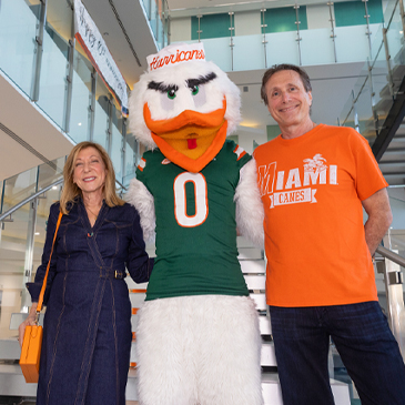 Tracy and Bruce Berkowitz, chairs of the Fairholme Foundation, photographed with Sebastian the Ibis during the anniversary celebration. Photo: Joshua Prezant/University of Miami 
