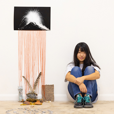 Cherlynn Zhang M.F.A student pictured with art at the UM Wynwood Gallery for Art Basel Miami Beach.  