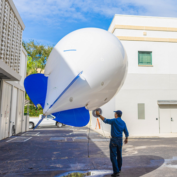 Researchers at the College of Engineering and Miami-based smart balloons company Alta Systems launched a tethered blimp over the Coral Gables Campus to collect first-of-its-kind data on aerosol particles in Miami. 
