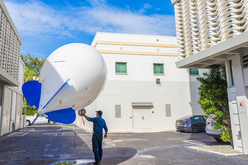 Researchers at the College of Engineering and Miami-based smart balloons company Alta Systems launched a tethered blimp over the Coral Gables Campus to collect first-of-its-kind data on aerosol particles in Miami. 