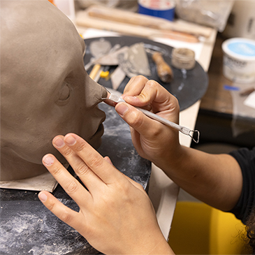 Sepideh Kalani works on a sculpture in her art studio.
