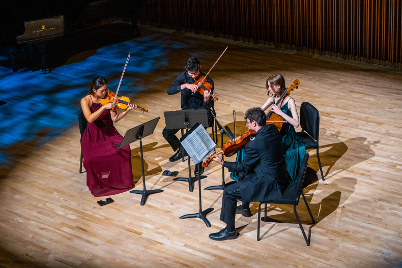 Students in the Frost School Stamps Scholars Program perform at the Knight Center for Music Innovation Newman Recital Hall during the opening festival. 