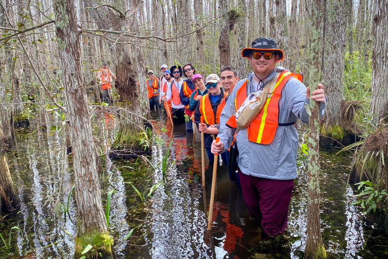 Students in the Everglades law class participate in a swamp walk through Big Cypress National Preserve in the southwestern part of the Everglades. Photo: Kelly Cox/University of Miami