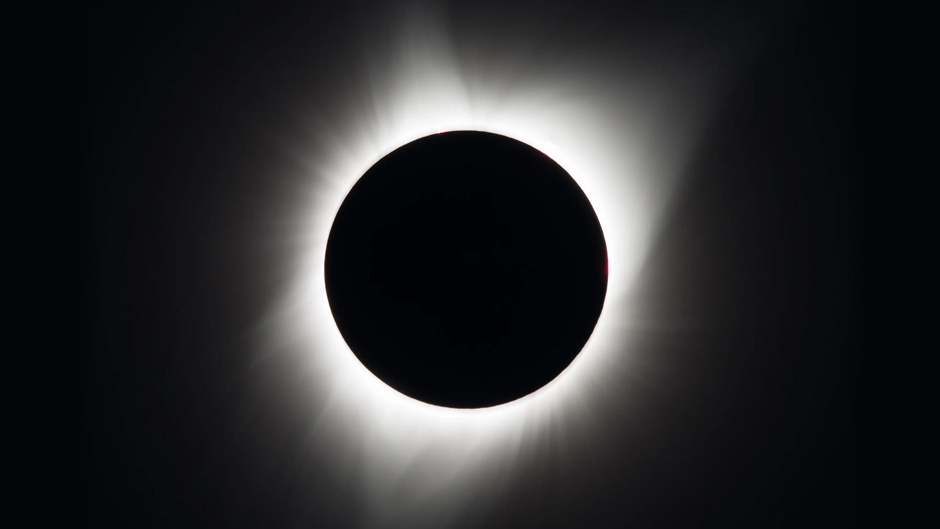 During a total solar eclipse, the sun's ghostly white corona appears around the black disk of the moon. This total solar eclipse was photographed on Aug. 21, 2017 in Oregon. 
