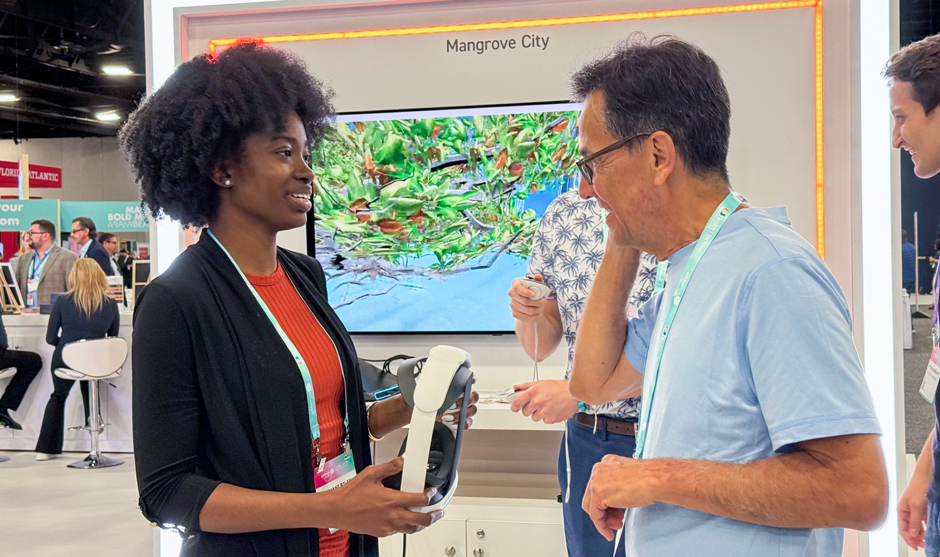 Kumani Riley demonstrates the app Mangrove City