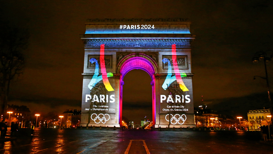 The Eiffel Tower-shaped bid logo for the Paris 2024 is unveiled on The Arc of Triomphe on the Champs Elysees in Paris, France, Tuesday, Feb. 9, 2016. Leaders of the Paris bid for the 2024 Olympics boosted their public campaign on Tuesday as they secured about 8 million euros ($8.9 million) in sponsorship deals with four major French groups. (AP Photo/Francois Mori)