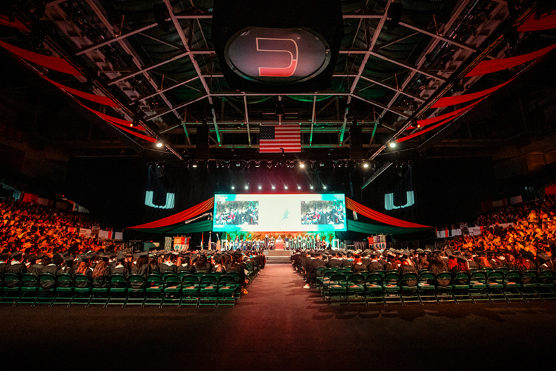 A photograph of the December 2023 Commencement ceremony held at the Watsco Center on the Coral Gables Campus
