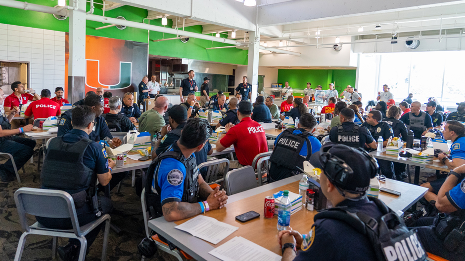 First responders participate in a debriefing following Operation Phoenix