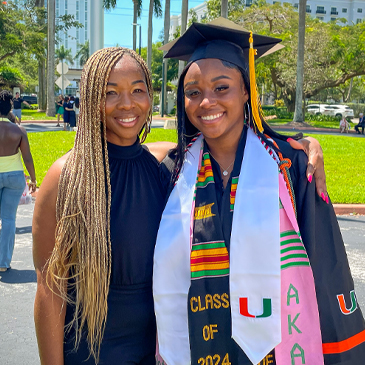 Hope Brown, left, of West Palm Beach, and her daughter, Brianna Benjamin, who graduated with a bachelor’s degree in global health on Friday, May 10. Photo: Janette Neuwahl Tannen/University of Miami