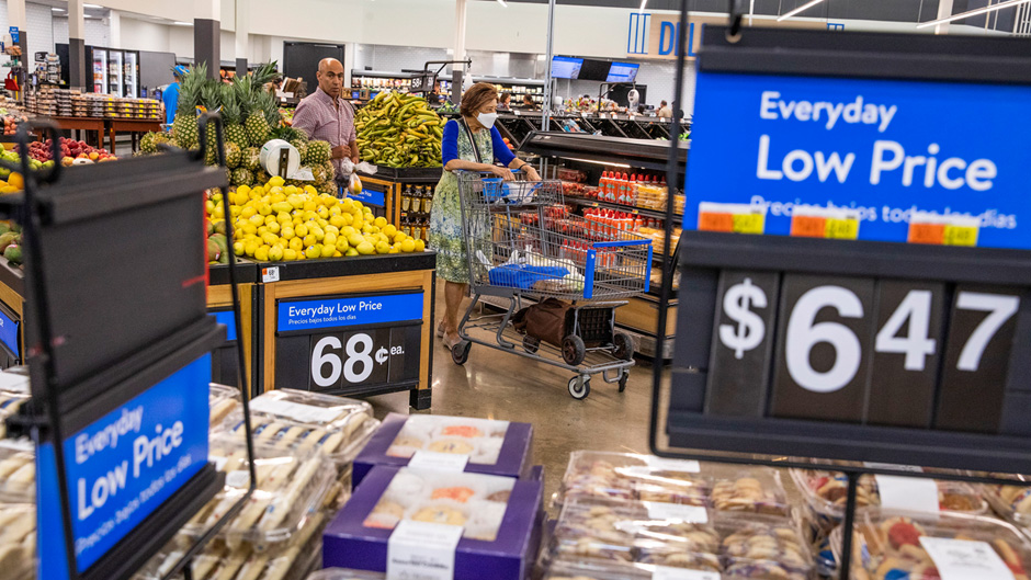 People buy groceries at a Walmart Superstore in Secaucus, New Jersey, in July.