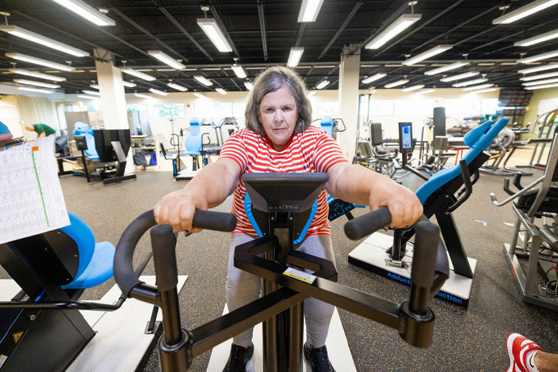 Gladys Mendez,  73, from Miami, works out doing  weight training exercises at the Max Orvitz Laboratory as part of a study on aging gracefully.