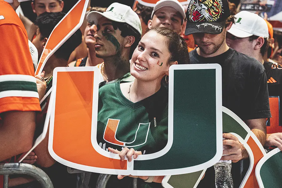 Student with sign at ESPN College GameDay 2025.