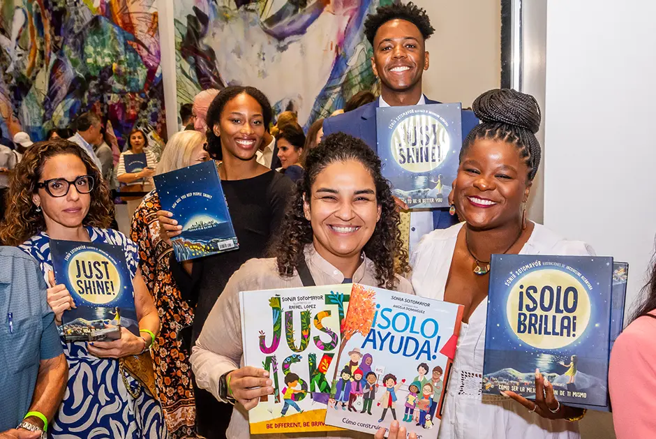 Event attendees were encouraged to take home a copy of “Just Shine!” 