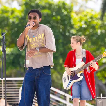 Student band Poster Child performs at the Lakeside Patio.
