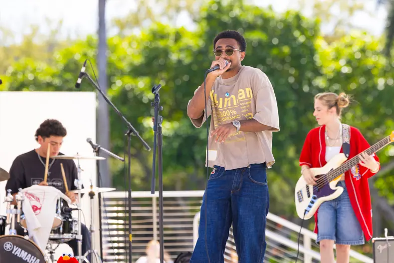 Student band Poster Child performs at the Lakeside Patio.