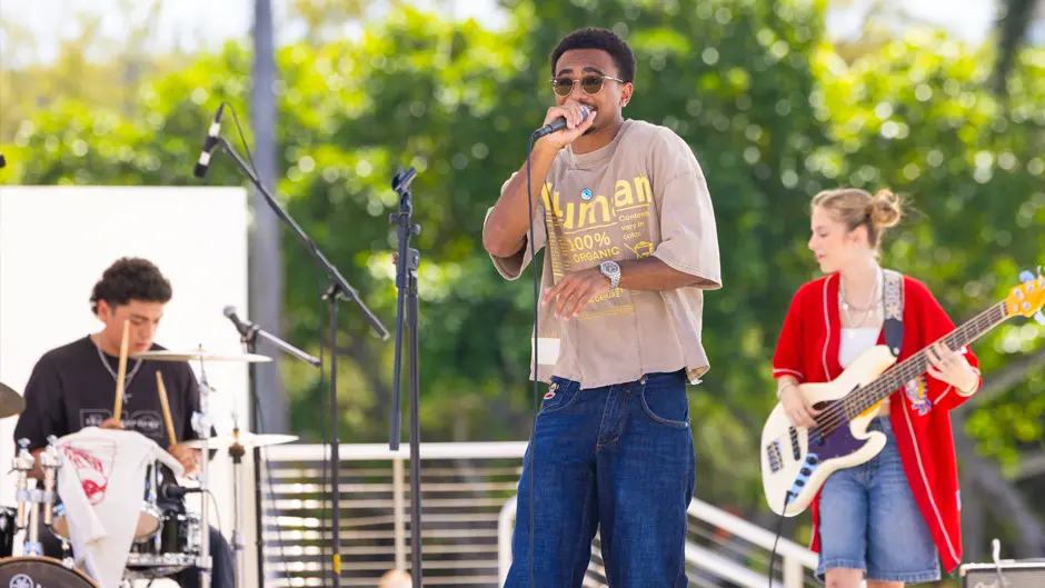 Student band Poster Child performs at the Lakeside Patio.
