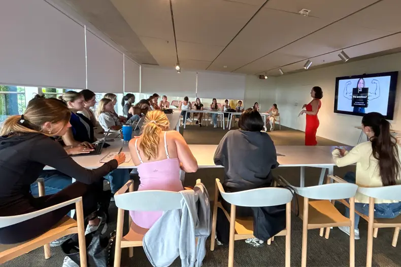 University alumna Alexa Ferra, senior director of marketing and communications at PAMM, speaks to undergraduate students 