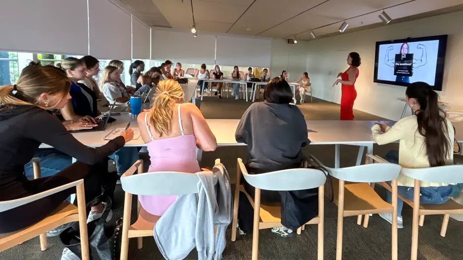 University alumna Alexa Ferra, senior director of marketing and communications at PAMM, speaks to undergraduate students