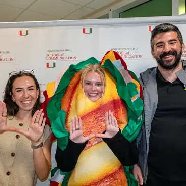 Sabrina Pizziol, manager of brand public relations for Subway and a University of Miami alumna, poses with senior Madison Jursca and Brad Simon, senior director of brand communications for Subway, following the students’ capstone presentation at the School of Communication. 
