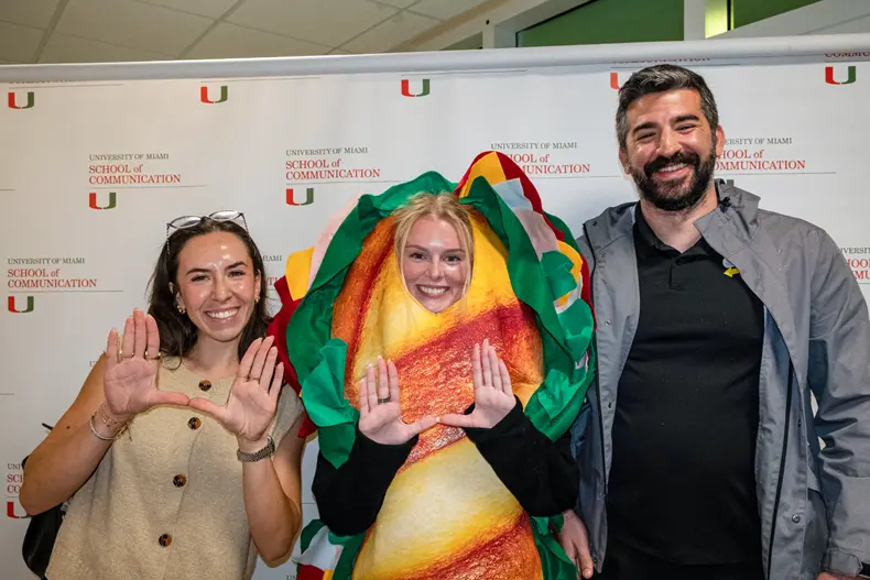 Sabrina Pizziol, manager of brand public relations for Subway and a University of Miami alumna, poses with senior Madison Jursca and Brad Simon, senior director of brand communications for Subway, following the students’ capstone presentation at the School of Communication. 