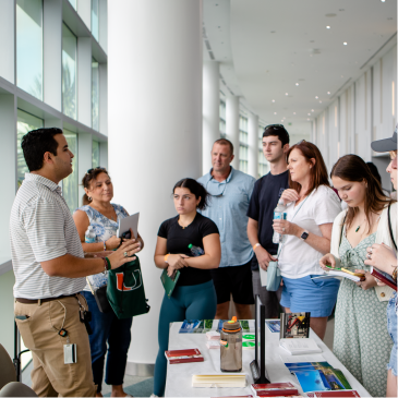 Families speaking to University of Miami representative at Preview the U.