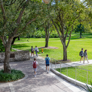 Students walking through the Dooley Memorial courtyard. 