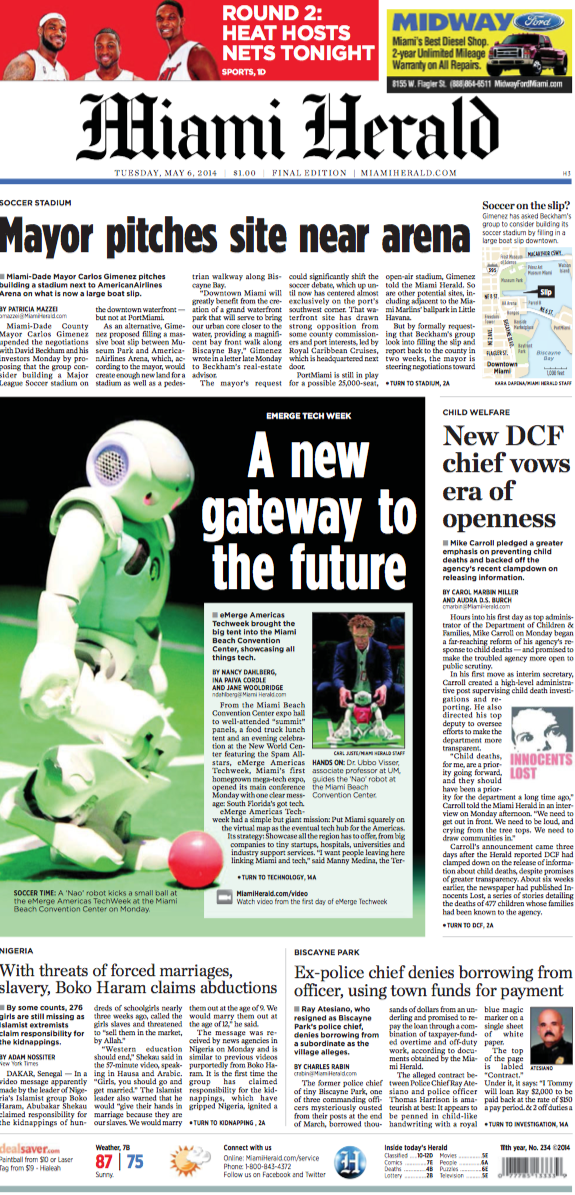 A soccer-playing robot from the artificial intelligence lab of Professor Ubbo Visser, pictured on the front page of the Miami Herald