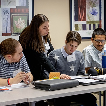 Nathalie Stanish working with program participants