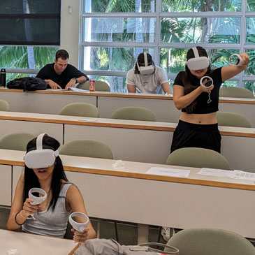 Students using virtual reality headsets in a philosophy class 