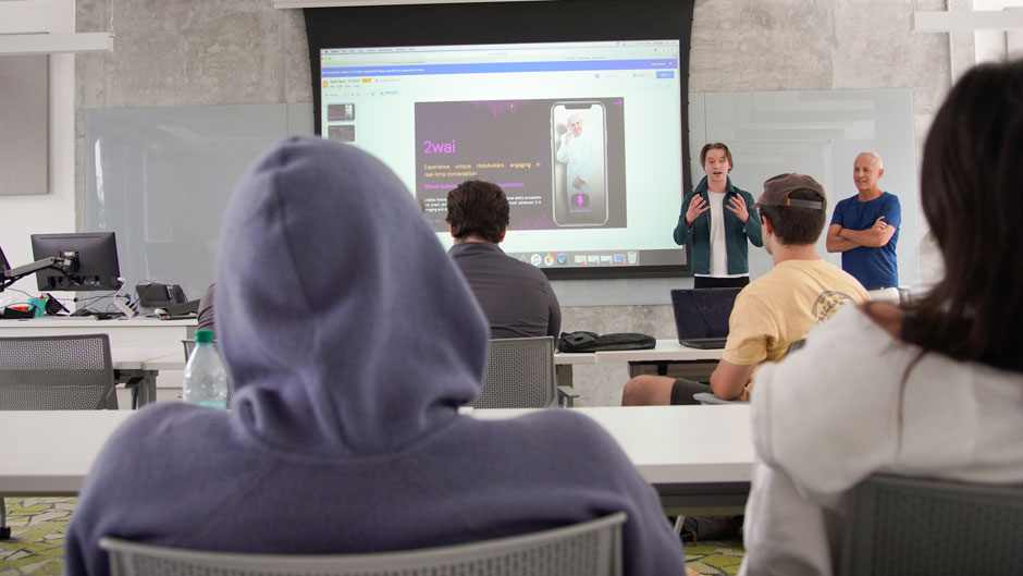 Calum Worthy and Russell Geyser speaking to the design thinking class