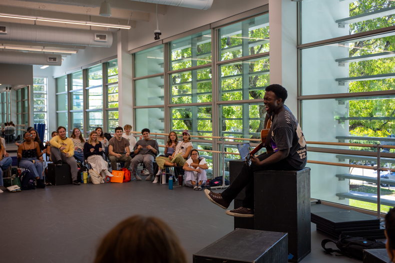 Joshua Henry singing to a theater arts class