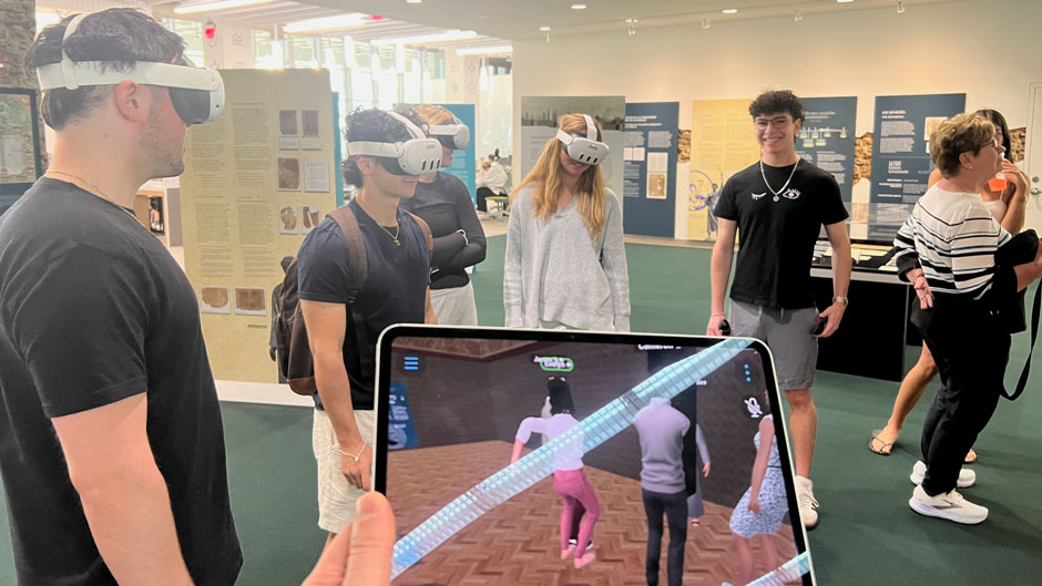 Students wearing augmented reality headsets