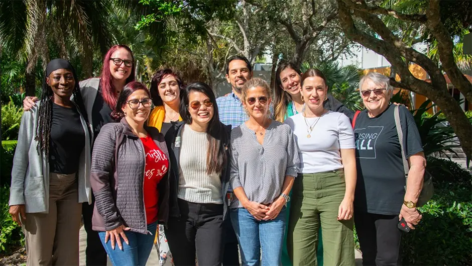 Kathryn Nowotny, second from left, poses for a photo with collaborators from IDEA, EZRI, and LEAP.