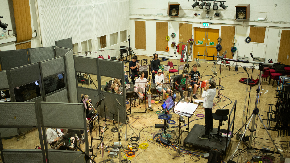 John Daversa (standing) leads the recording at Abbey Road. Photo courtesy of the Royal Academy of Music.