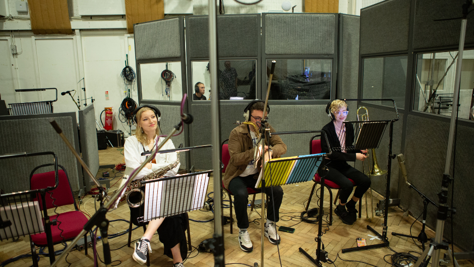 Recording at Abbey Road; Izzi Guzman is at far right. Photo courtesy of the Royal Acdemy of Music.