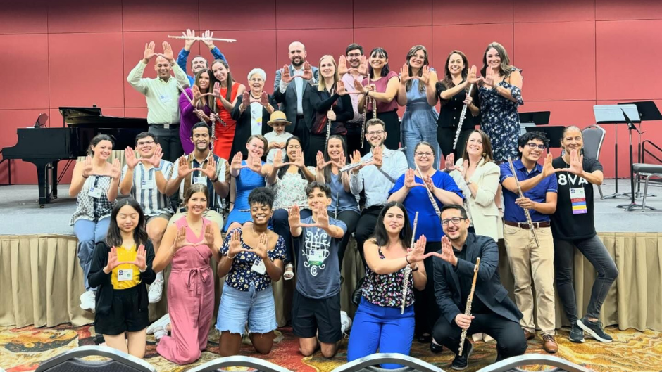 Generations of Frost School flute students with former professor Trudy Kane (back row) at the National Flute Convention this summer. 