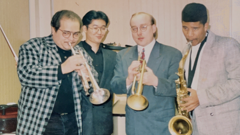 Brian Lynch (second from right) with fellow horn players in Latin bandleader Eddie Palmieri's group in the 1990's, in one of the photos that appears in '7x7by7'. Photo courtesy Brian Lynch. 