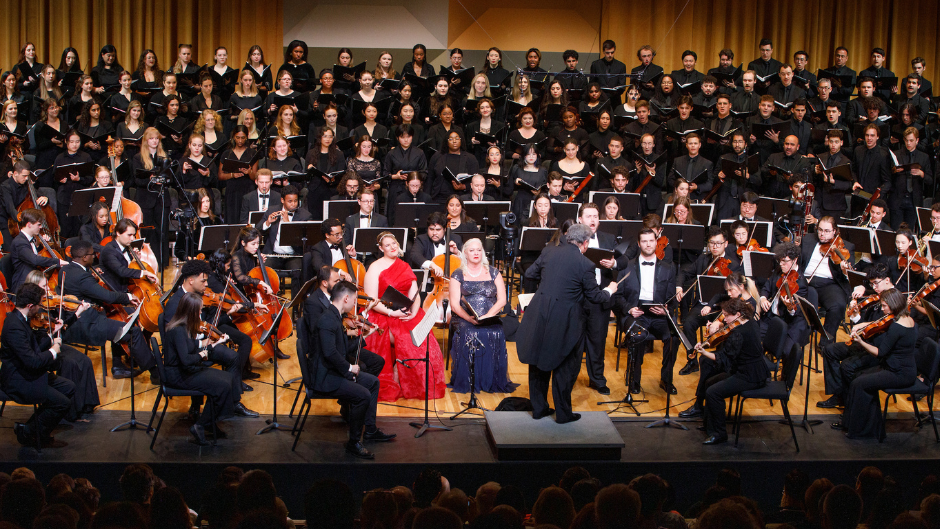 The Frost Symphony Orchestra and combined Frost School choirs with Maestro Gerard Schwarz, preparing to perform Beethoven's 9th Symphony at Gusman Concert Hall last April.