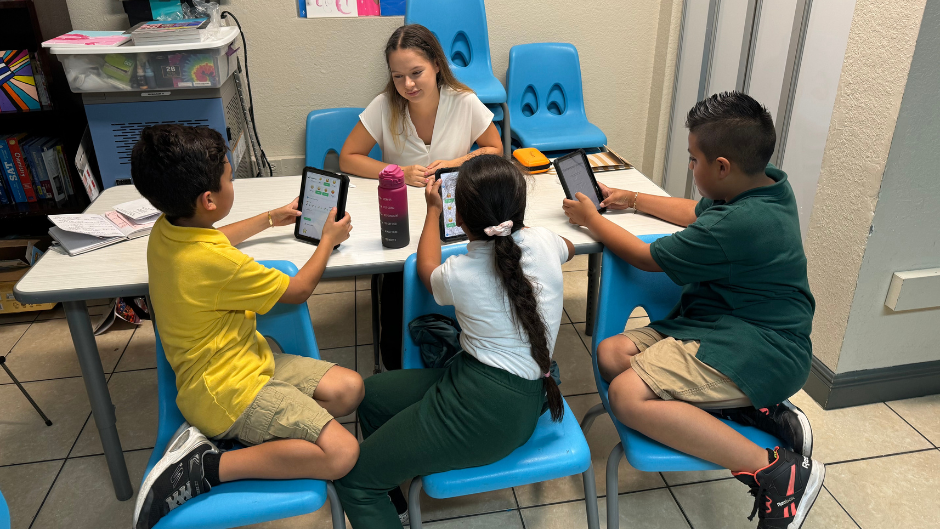 frost school music education student rowan klaus working with children in little havana for the music for childhood well-being initiative