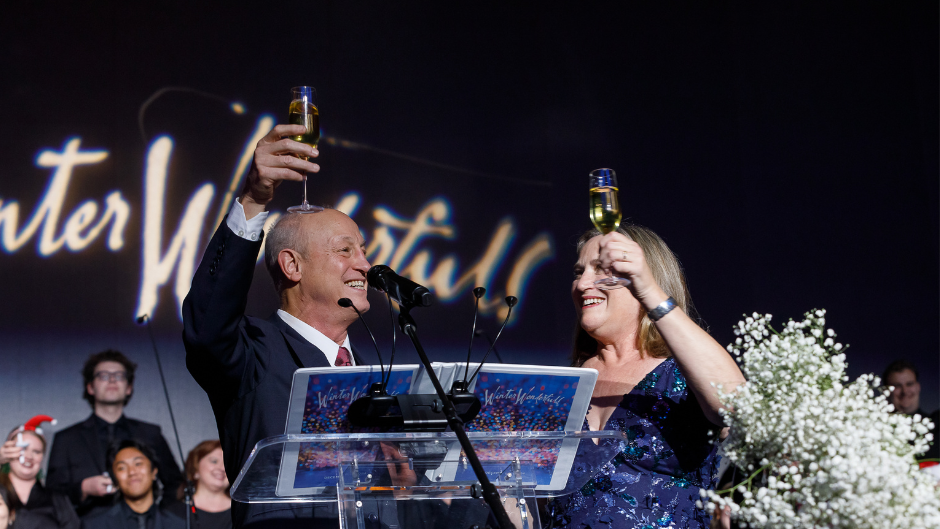 Dean Shelton G. Berg and wife Julia Berg toast Winter Wonderful guests. Photo Frost School of Music.