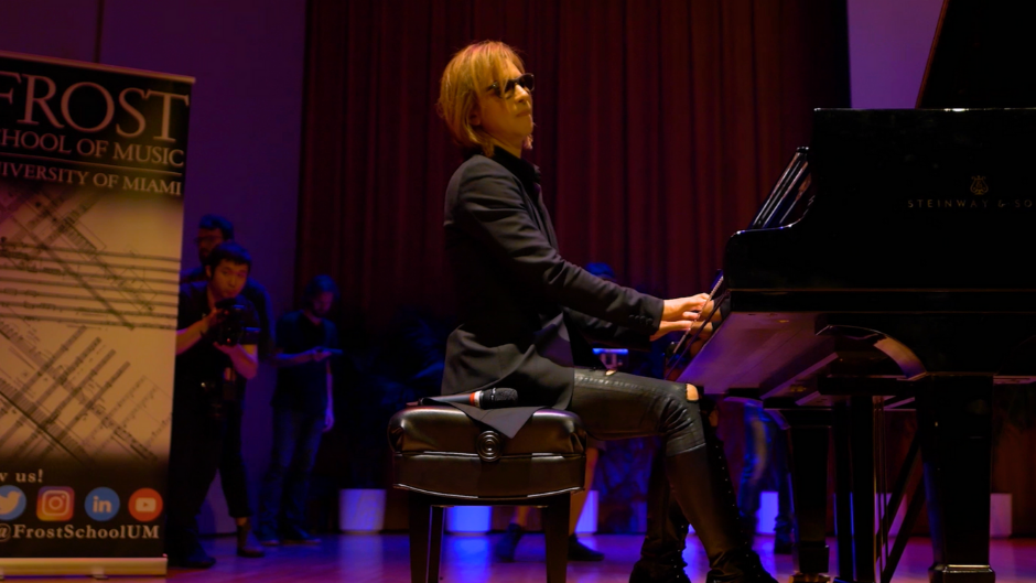 yoshiki performing at the frost school in 2019