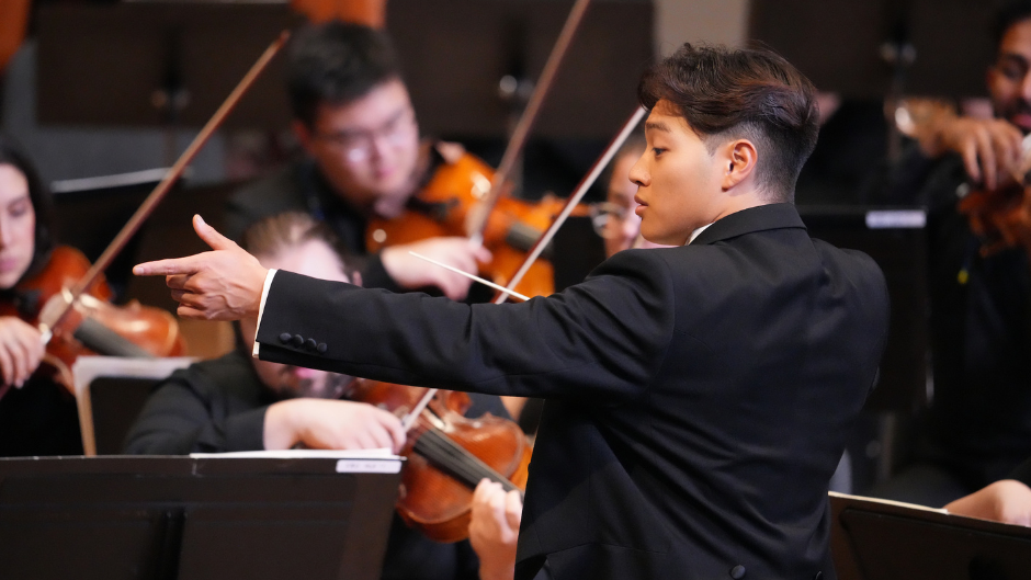Harris Han conducting at a Frost School of Music showcase. Photo courtesy Frost School of Music.
