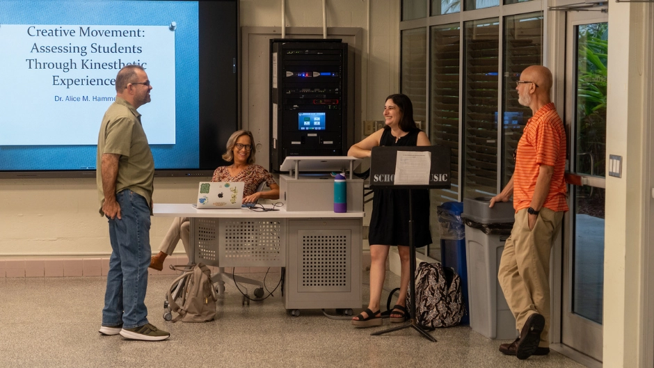 (l. to r.) Frost School graduate student Edward Ercilla, Alice Hammel, graduate student Nerissa Rebagay, and music education professor Stephen Zdzinski. Photo by Gonzalo Mejia/Frost School of Music. 