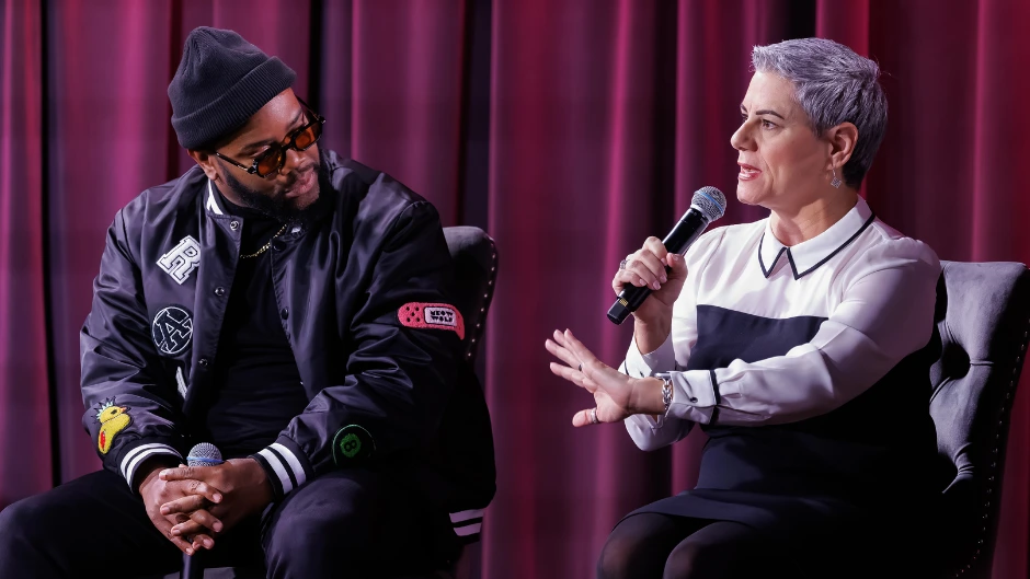 Artist and producer Roahn Hylton, left, with the Frost School's Serona Elton, chair of the music industry department. Photo courtesy of The Hollywood Reporter.