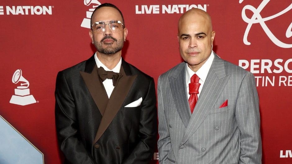 Frost School alumnus Danny Flores, right, with producing partner Jean "City" Rodriguez on the red carpet at the Latin Grammys. The duo shared in the Best Alternative Album win for "Papota." Photo courtesy of The Latin Recording Academy/Getty Images ©2025.