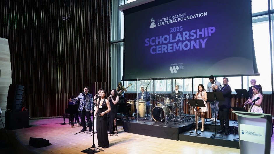 Irenda Arano Diaz and other scholarship recipients performing at the 2025 Latin GRAMMY Cultural Foundation scholarship ceremony at the Frost School's Knight Center for Innovation. Photo by John Parra/Getty Images for The Latin Recording Academy.
