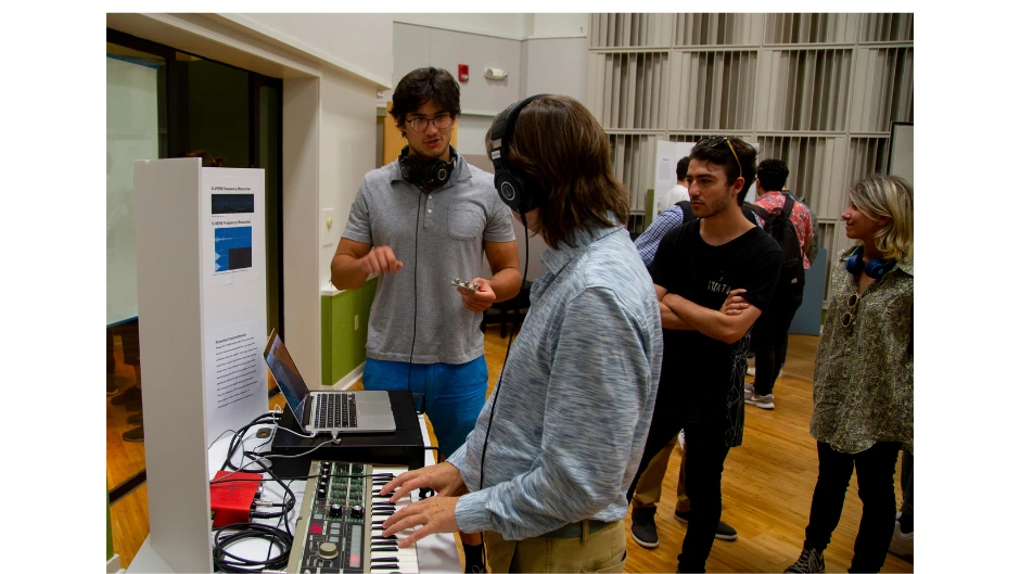 A group of music engineering students work on a project. Photo courtesy Christopher Bennett/Frost School of Music.