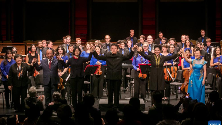 Composer Chen Yi (far left front) after the performance of one of her works. Photo credit: Michael Nagle/Xinhua 