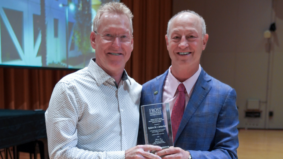 Robert M. Carnochan and Frost School of Music Dean Shelly Berg with the Frost Excellence Award. Photo: Gonzalo Mejia, the Frost School of Music.